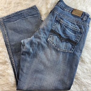 Flypaper medium wash men’s boot cut jean 26x30